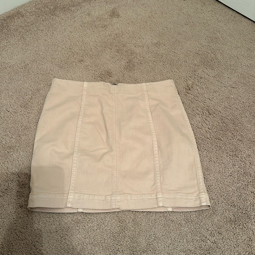 Muted light pink skirt